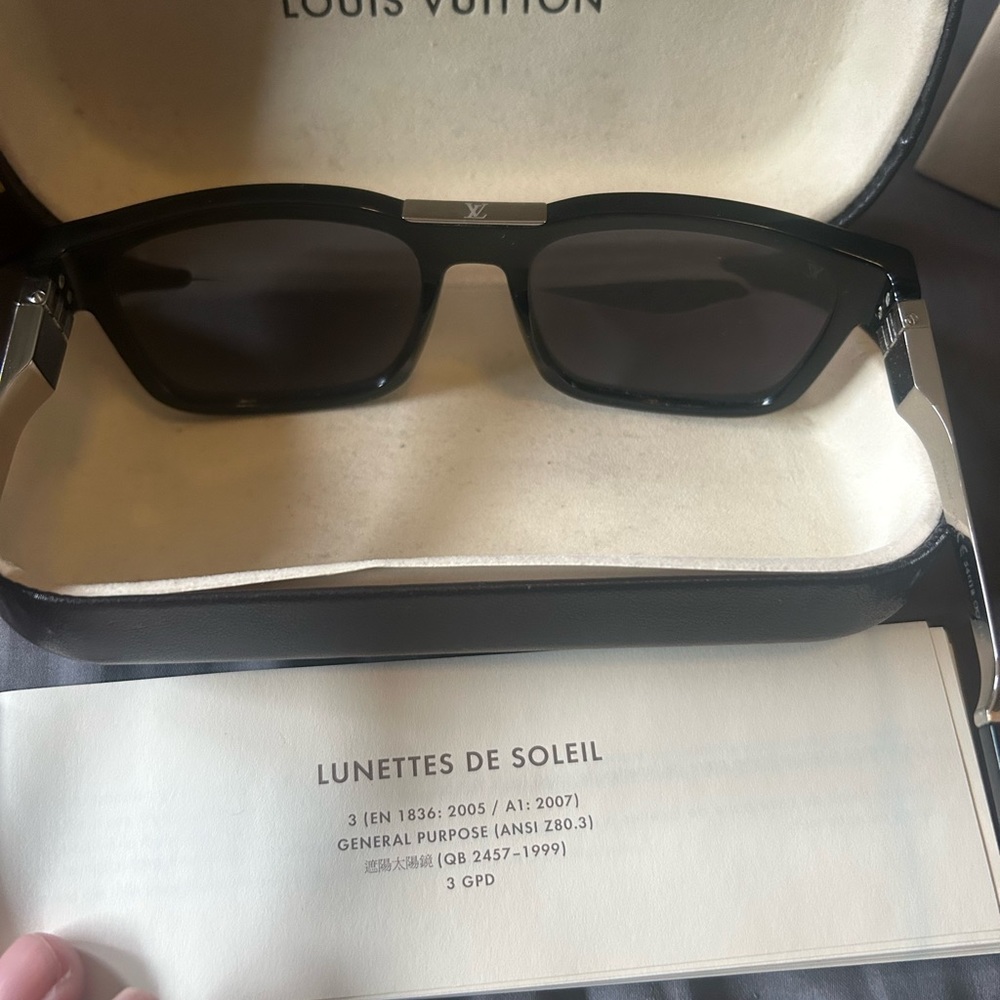 Unique LV Black with metal trim.  In original box, case and LV sunglasses pouch.